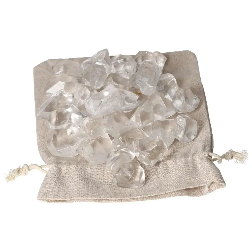 Tumbled Quartz Ice Cubes on fabric pouch, embodying elegance and spirituality from Sylvia Crystals, perfect for enhancing spiritual journey.