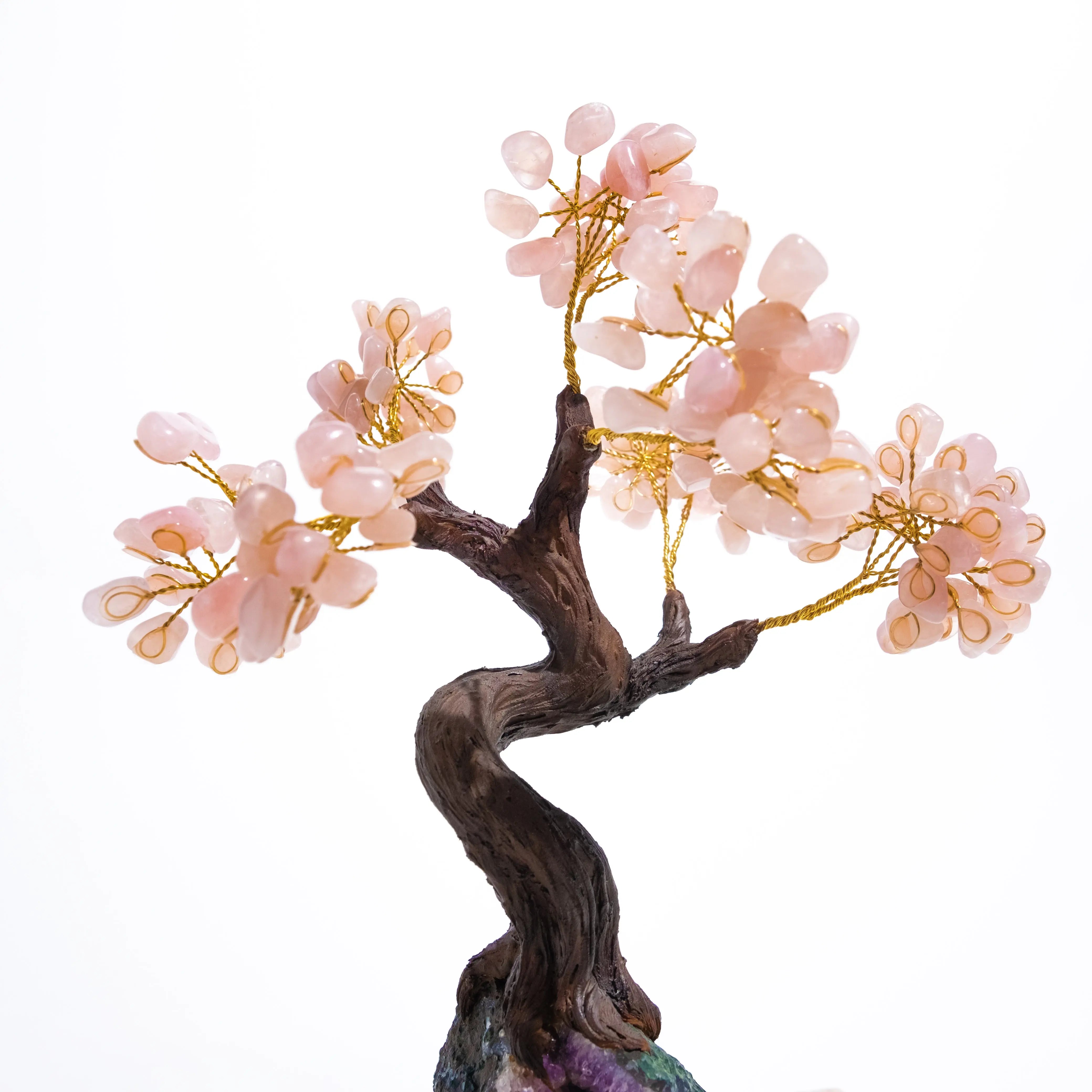 Tumbled rose quartz crystal tree, 40cm tall, featuring delicate pink gemstones on handcrafted branches, symbolizing love and harmony.
