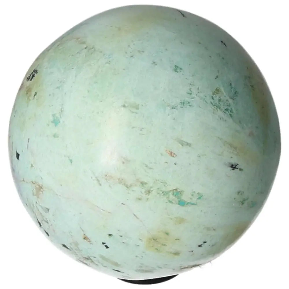 Turquoise sphere stone promoting communication, kindness, and honesty; ideal for nurturing friendships and offering travel protection.