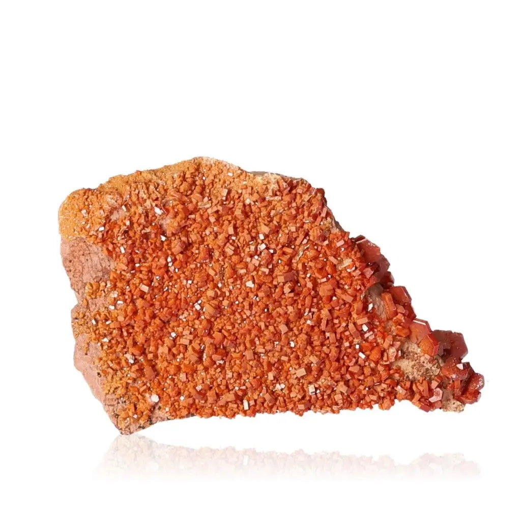 Vanadinite Druze stone with vibrant red-orange crystals, ideal for enhancing focus and creativity. Perfect for mineral collectors.