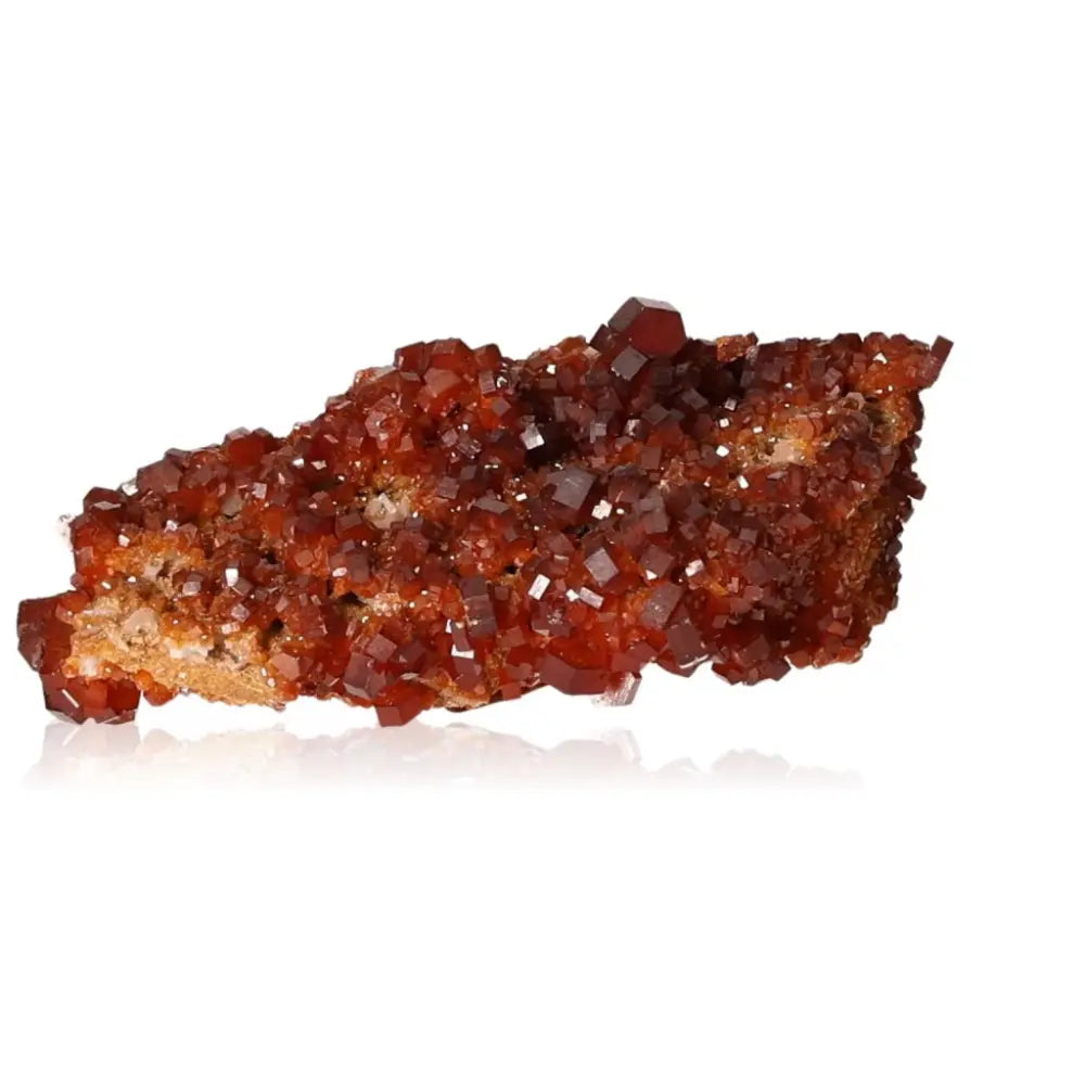 Vanadinite druzy crystal displaying vibrant red-orange hues, ideal for collectors and enhancing focus and creativity.