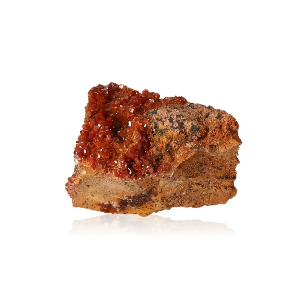 Vanadinite druzy mineral specimen with vibrant red-orange crystal formations, admired for its focus-enhancing and creative properties.