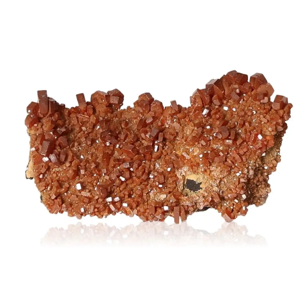 Vanadinite Druze with vibrant red-orange hues, showcasing unique crystal formations. Ideal for collectors and enhancing focus and creativity.