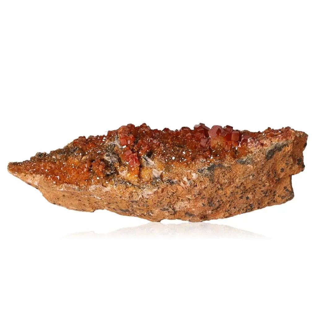 Vanadinite Druze with vibrant red-orange crystals showcasing unique formations, ideal for focus, creativity, and energy enhancement.