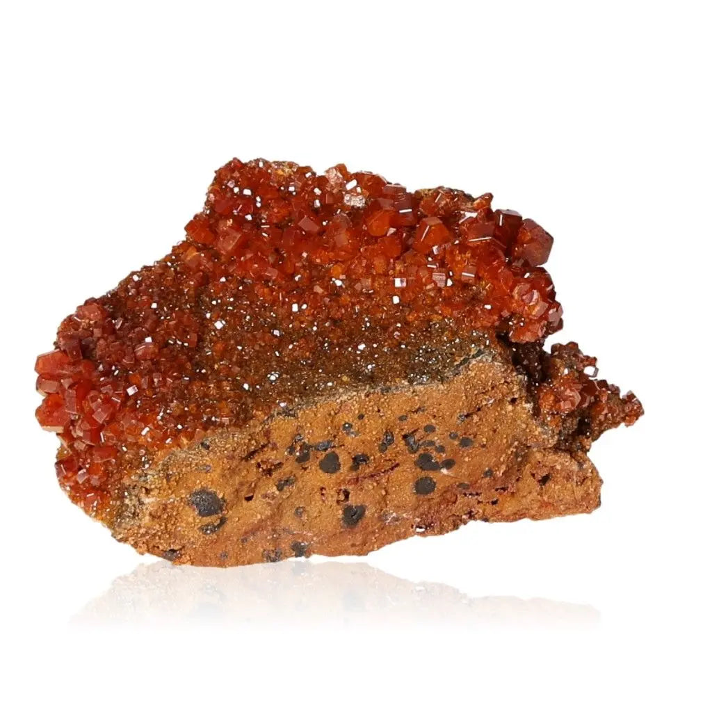 Vibrant Vanadinite Druze with fiery red-orange crystals, ideal for collectors and creatives seeking focus and energy.