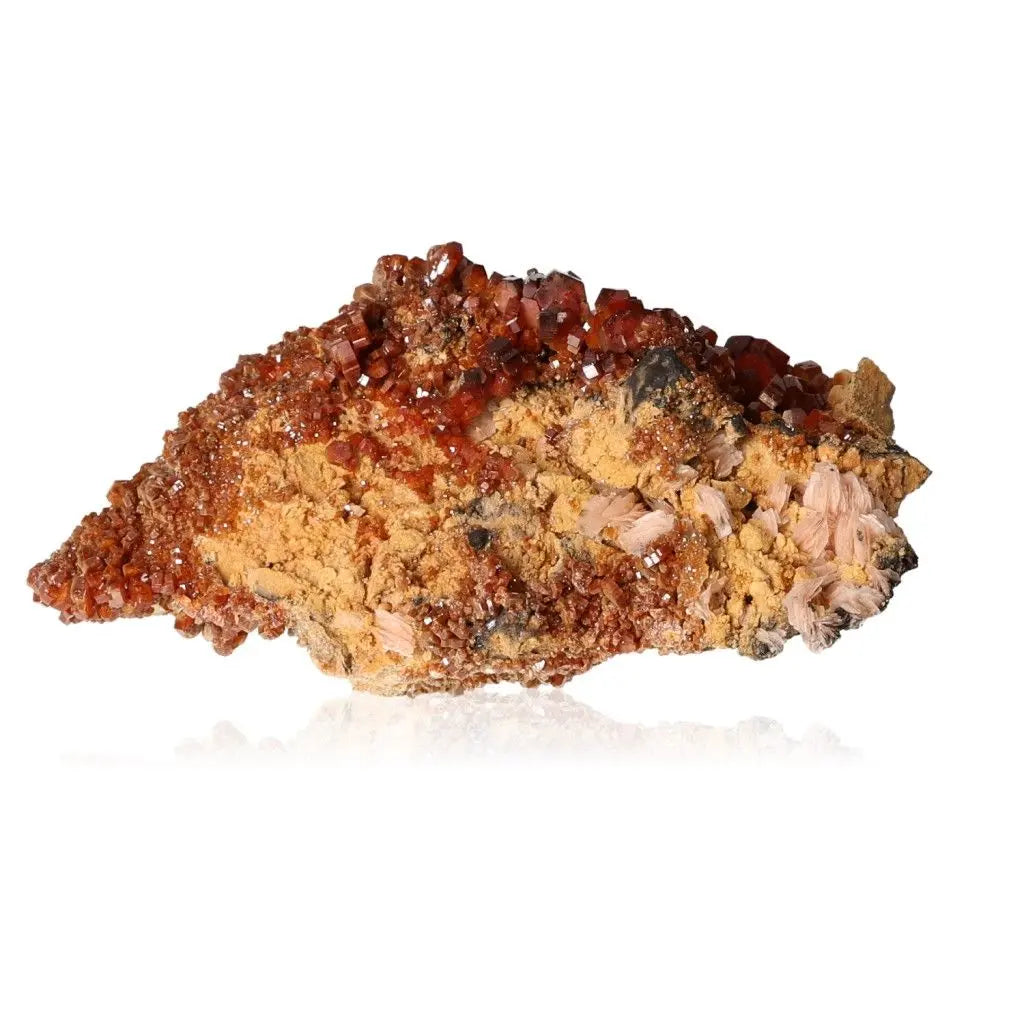 Vanadinite Druze crystal with vibrant red-orange hues, known for enhancing focus and creativity, ideal for collectors and creatives.