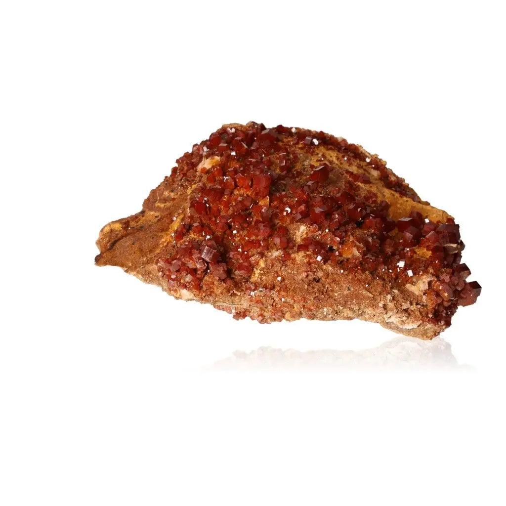 Vanadinite Druze mineral with vibrant red-orange crystals, ideal for focus and creativity. Perfect for collectors and enthusiasts.