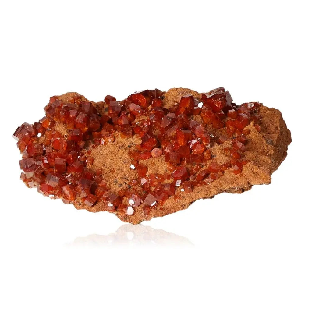 Vanadinite Druze mineral with vibrant red-orange crystal formations for focus and creativity.
