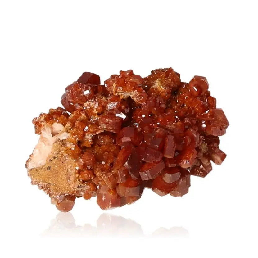 Vibrant red-orange Vanadinite Druze with unique crystal formations, ideal for collectors and enhancing focus and creativity.