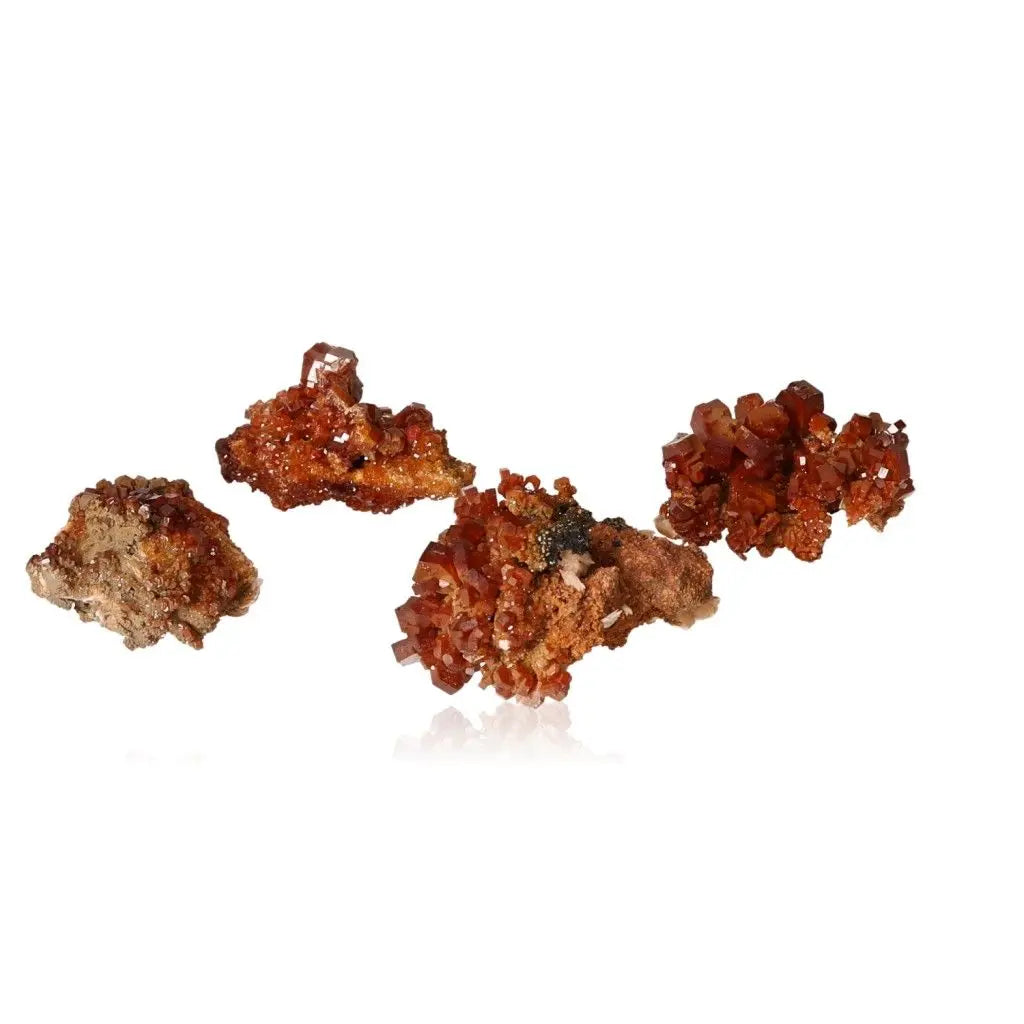 Vibrant red-orange vanadinite crystal druzes showcasing unique formations, ideal for collectors seeking creativity and focus.