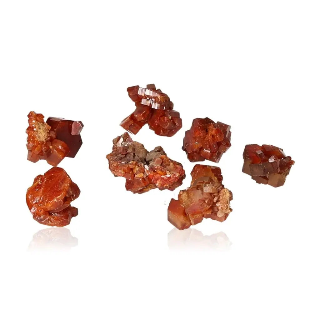 Vanadinite small druzes showcasing vibrant red-orange hues and unique crystal formations, ideal for enhancing focus and creativity.