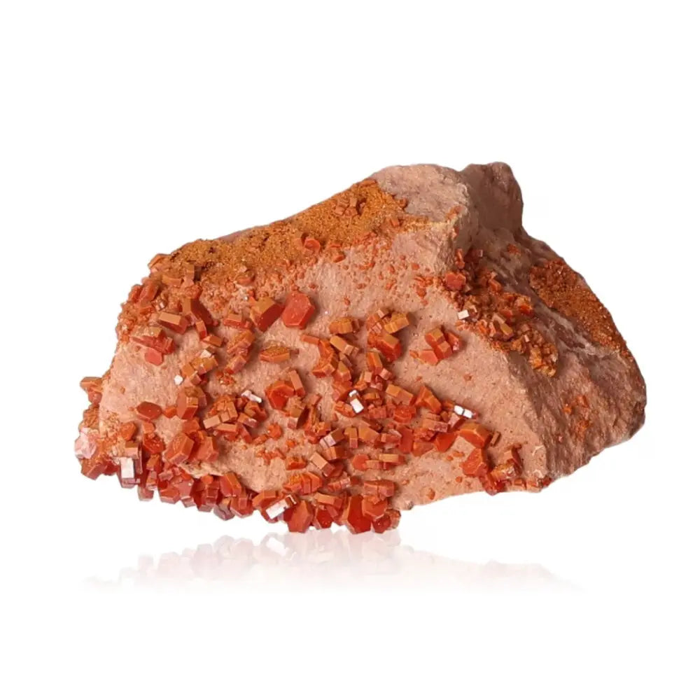 Vanadinite druzy showcasing vibrant red-orange crystals, ideal for enhancing focus, creativity, and energy in collectors and creatives.