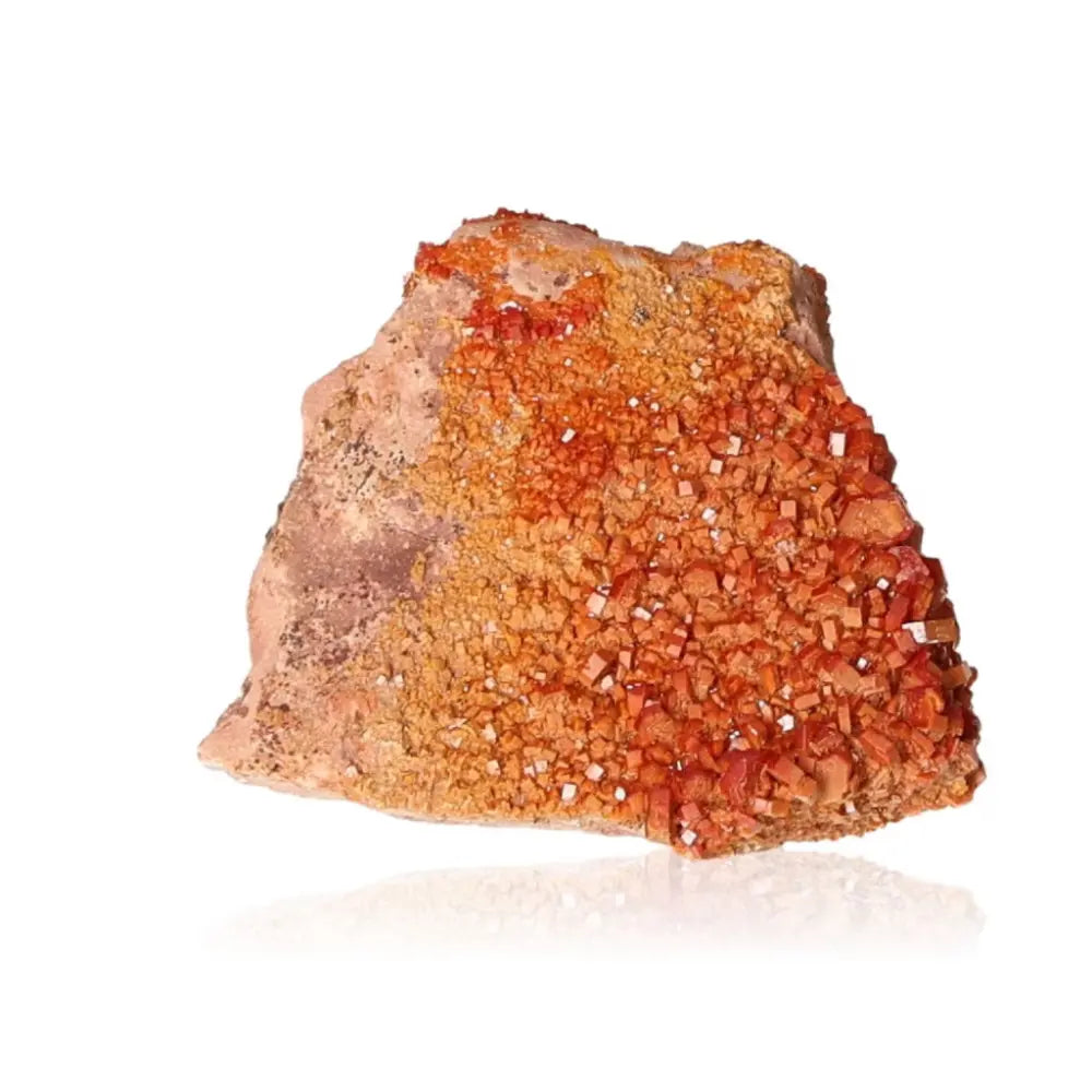 Vanadinite druze showcasing vibrant red-orange hues and intricate crystal formations, ideal for collectors and creativity seekers.