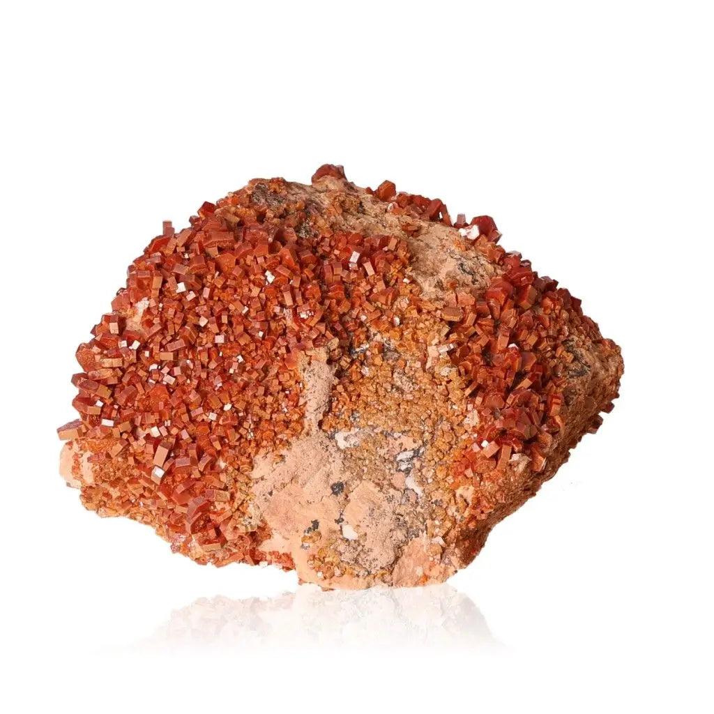 Vibrant red-orange vanadinite druze crystal formation, ideal for collectors and enhancing creativity and focus.