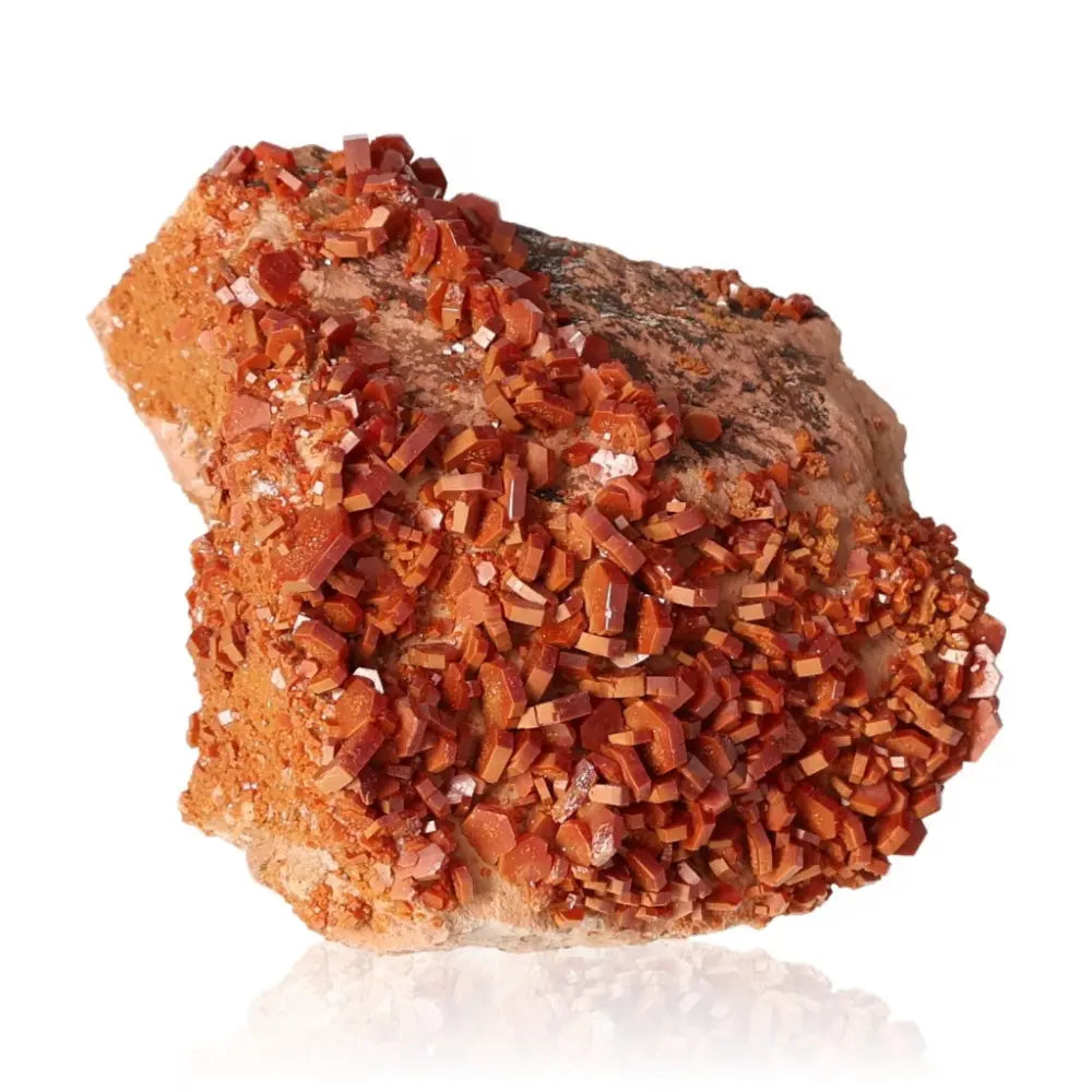 Vanadinite druzy crystal with vibrant orange-red hues, perfect for collectors and creatives seeking focus and grounding energy.