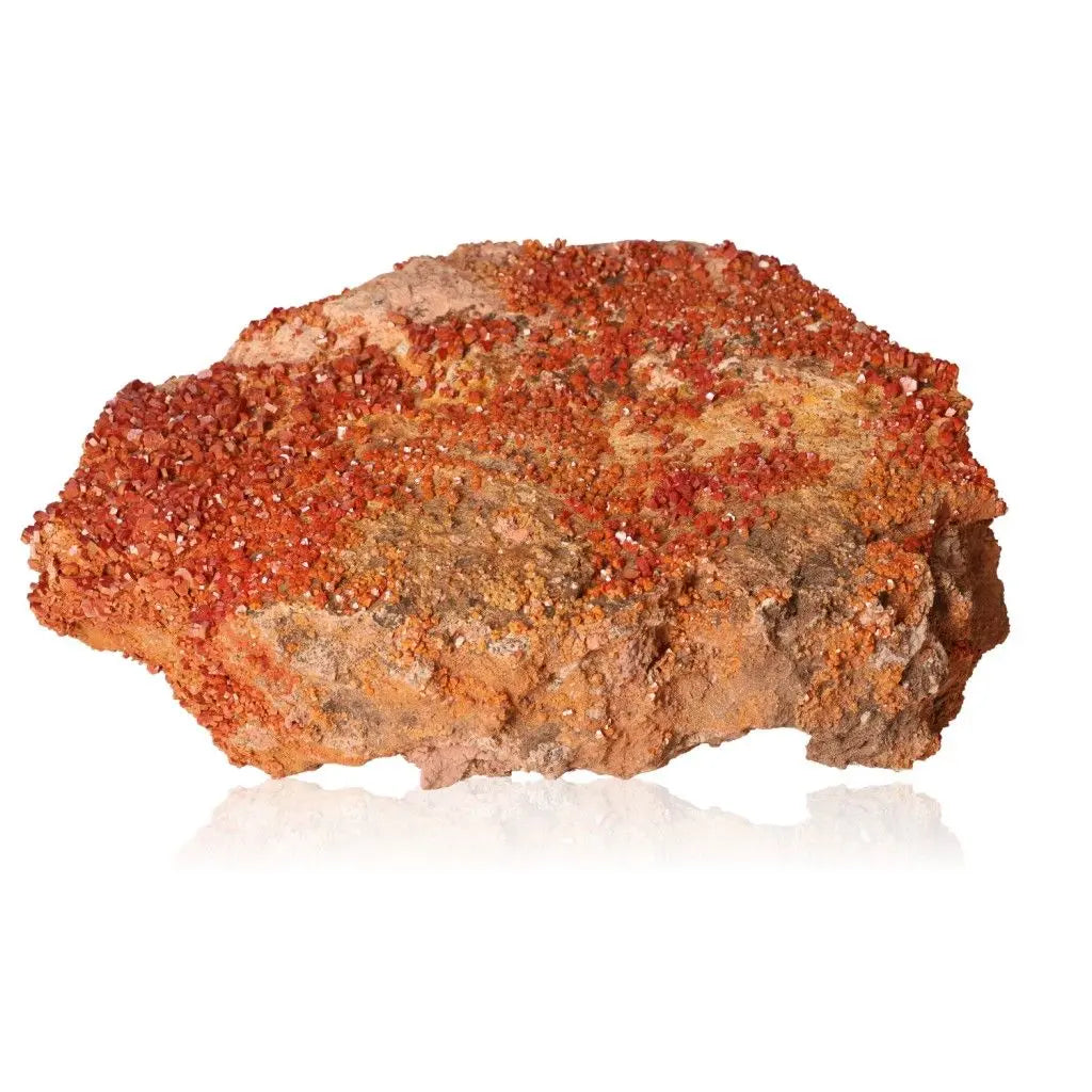 Vibrant red-orange Vanadinite druze stone showcasing unique crystal formations, ideal for collectors seeking focus and creativity.