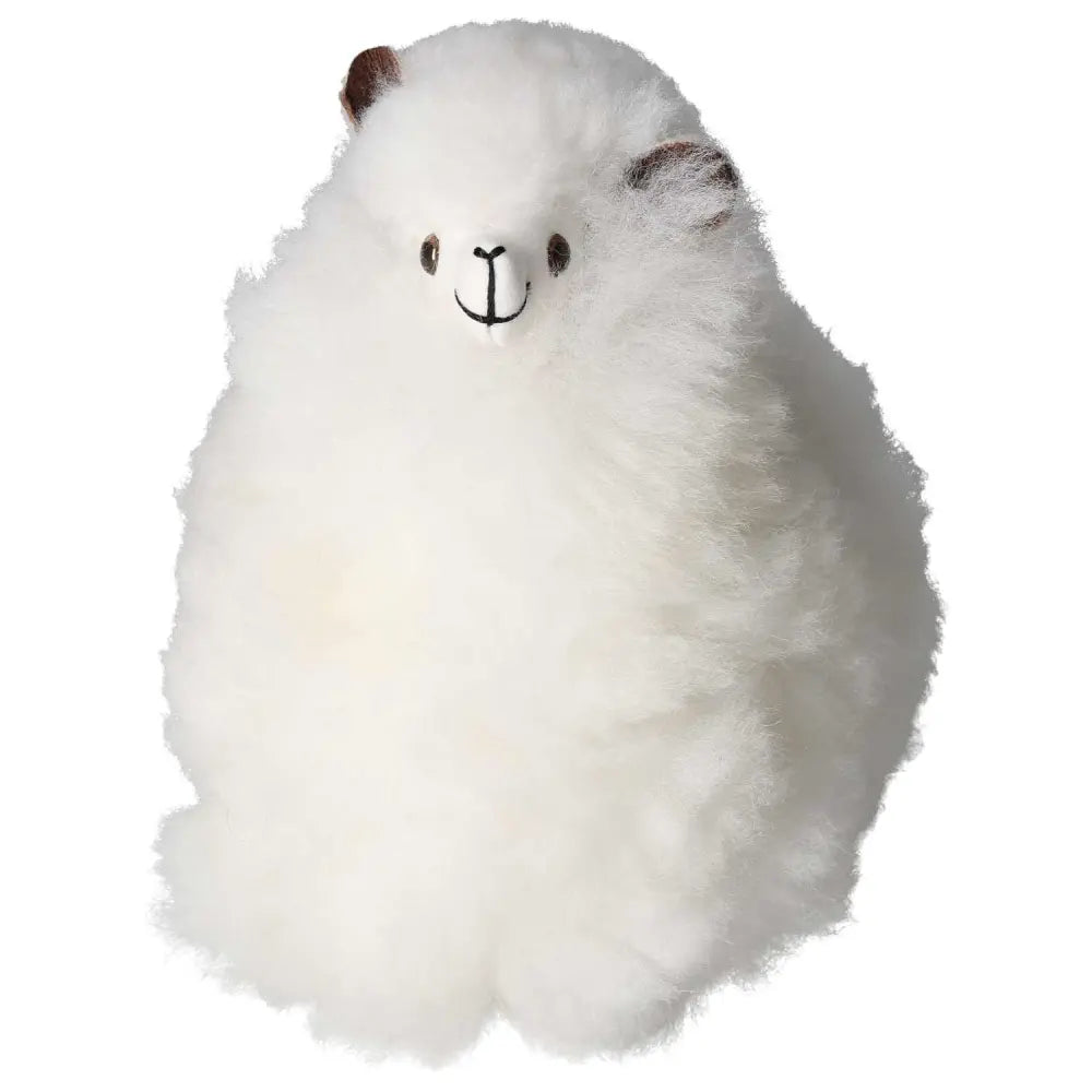 White alpaca plush toy made from 100% natural alpaca hair, handcrafted in Peru, showcasing softness and ethical sourcing.