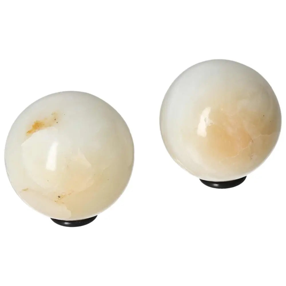 White Onyx Sphere for enhancing determination and self-discipline, ideal for overcoming challenges and emotional burdens.