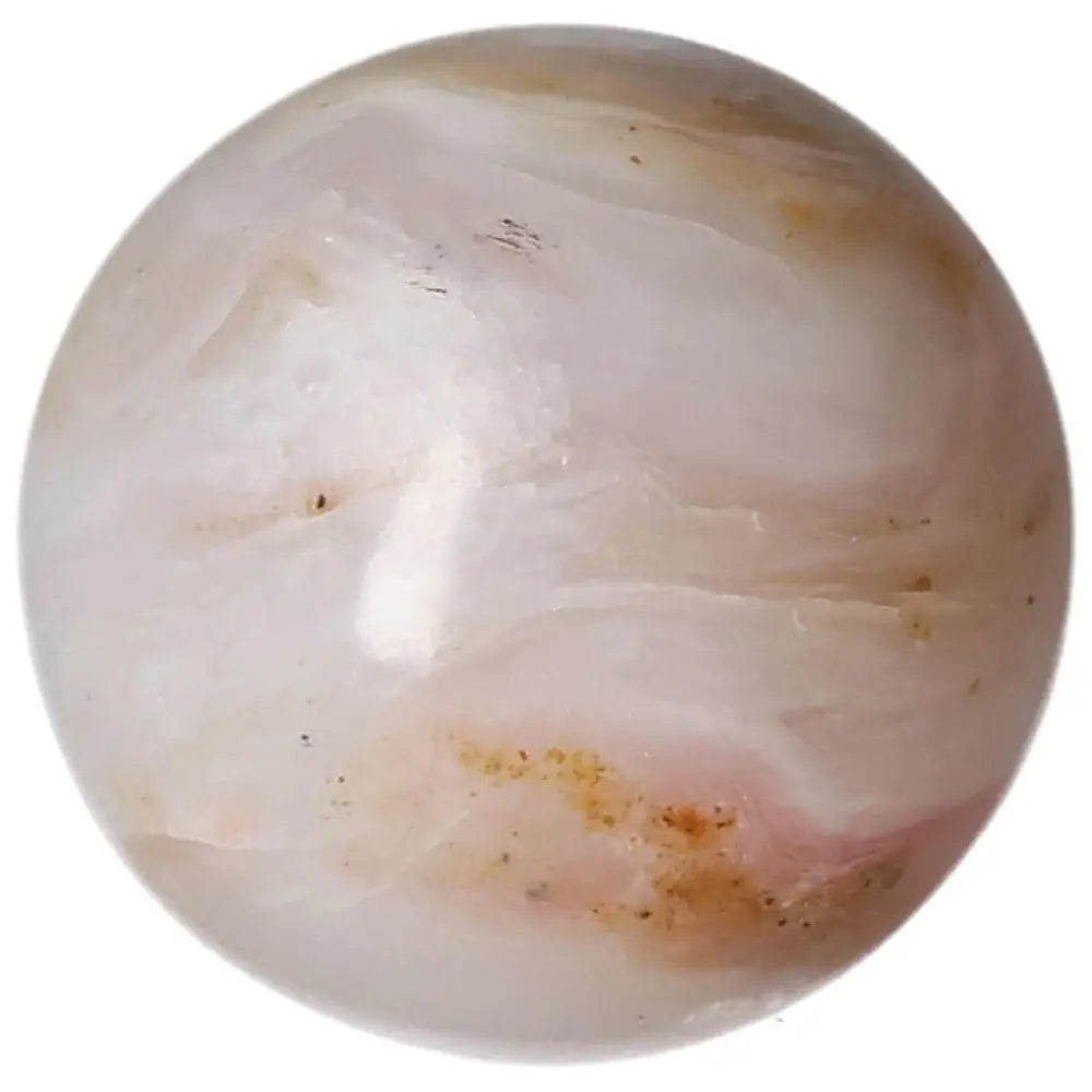 White Onyx Sphere for strength and self-discipline, promoting control and release from past burdens. Natural stone with pink-orange patterns.
