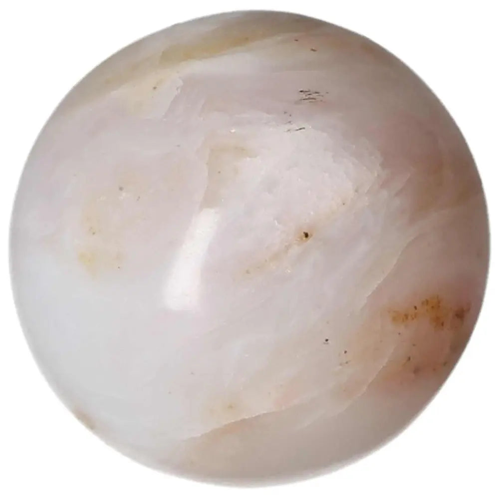 White Onyx Sphere for empowerment and self-discipline, symbolizing strength and resilience, aids overcoming challenges and releasing past burdens.