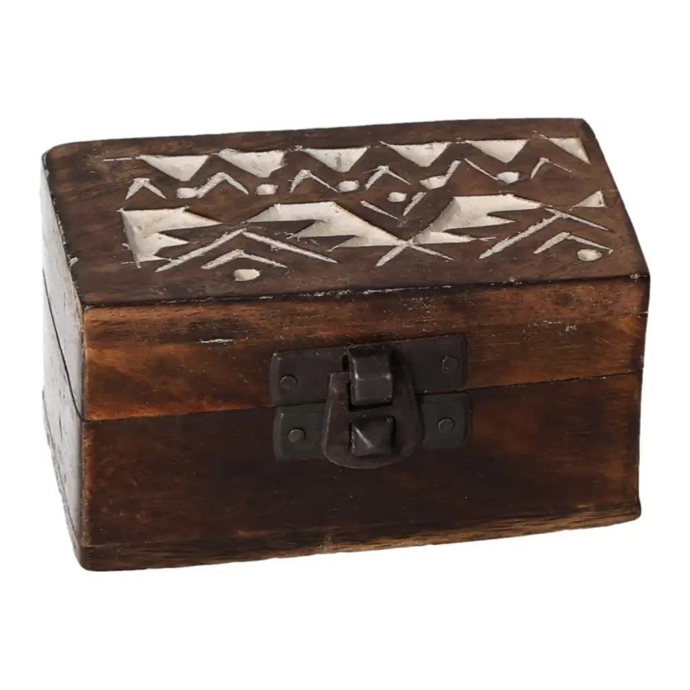 White washed wooden pill box with Slavic design, featuring intricate carvings and a secure latch, measuring 3x1.5 inches.