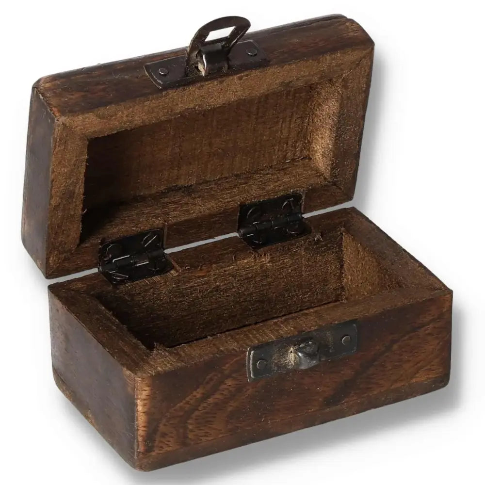 Open wooden pill box with carved design, dimensions 9x5x4cm, showcasing the interior space.