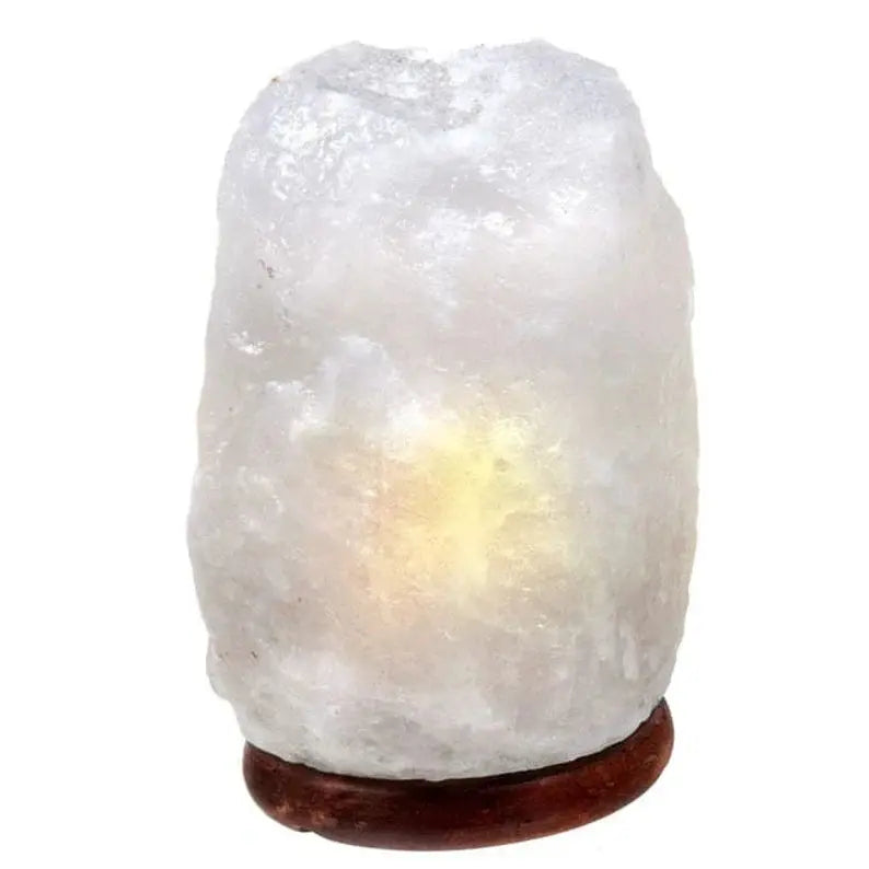 Himalayan Salt Lamp 1Kg emitting warm amber light, hand-carved from authentic pink salt crystals for tranquil home décor.