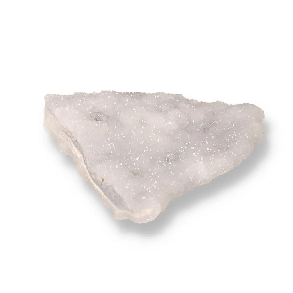 Triangular piece of white chalcedony gemstone showcasing its translucent and sparkling surface, symbolizing harmony and emotional healing.