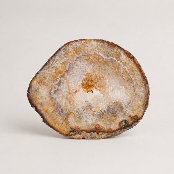 Clear quartz crystal mineral specimen on white background.