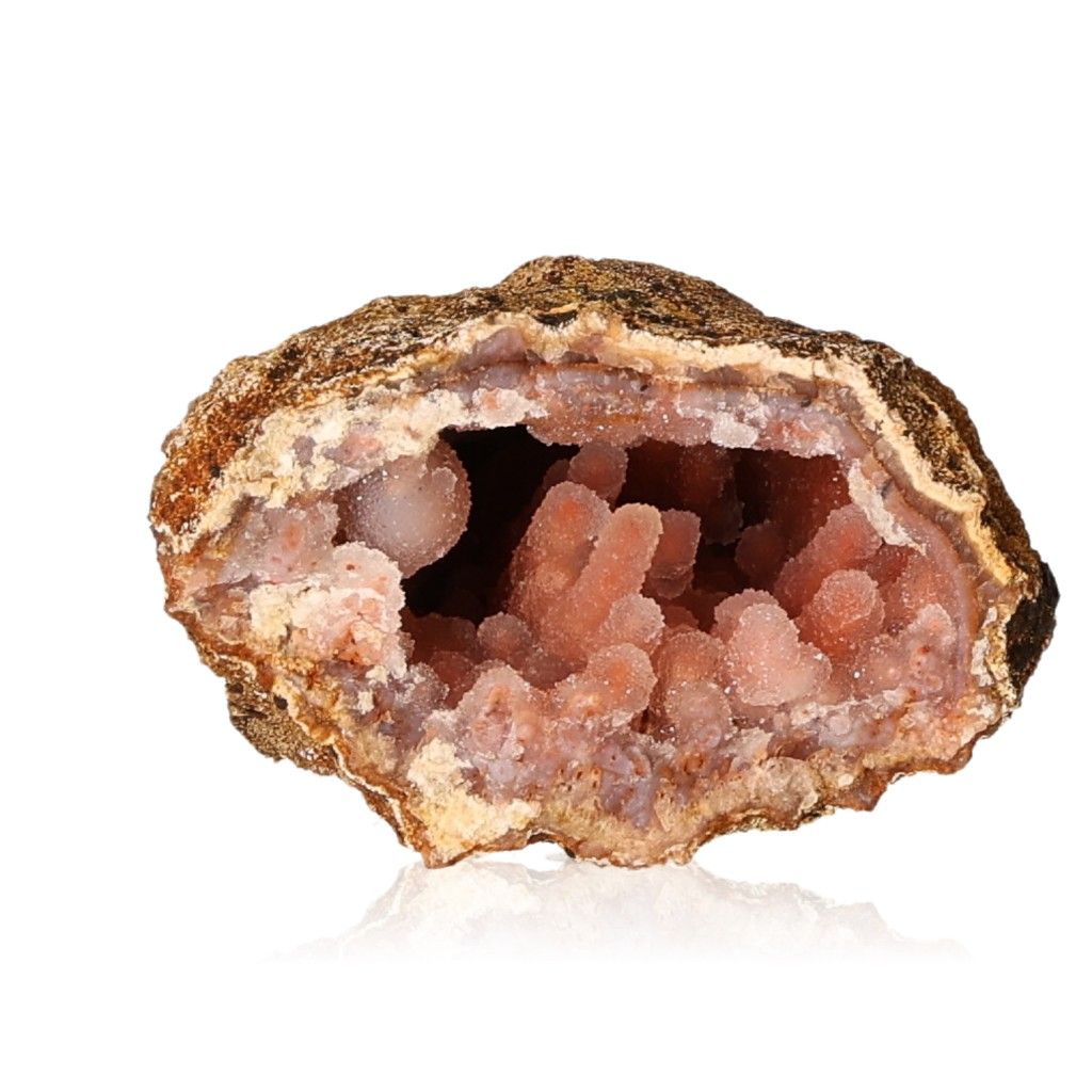 Calcite stalactites showcasing intricate formations and natural beauty in a vibrant geode, perfect for collectors and meditation spaces.