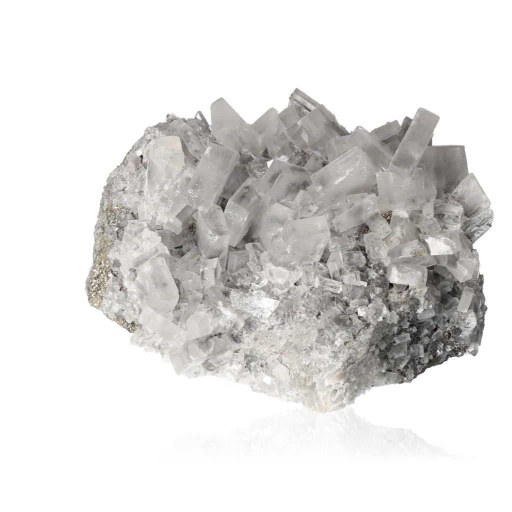 Clear quartz crystal mineral specimen on white background.