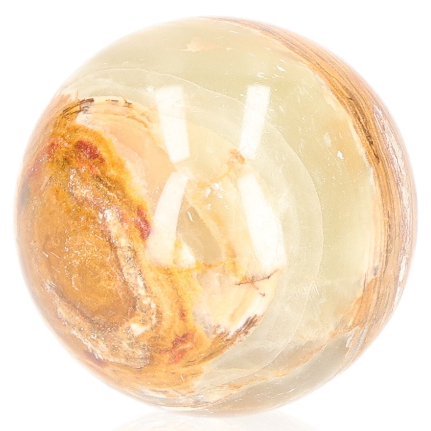 Polished onyx sphere gemstone showcasing natural earthy tones and patterns for strength and protection.