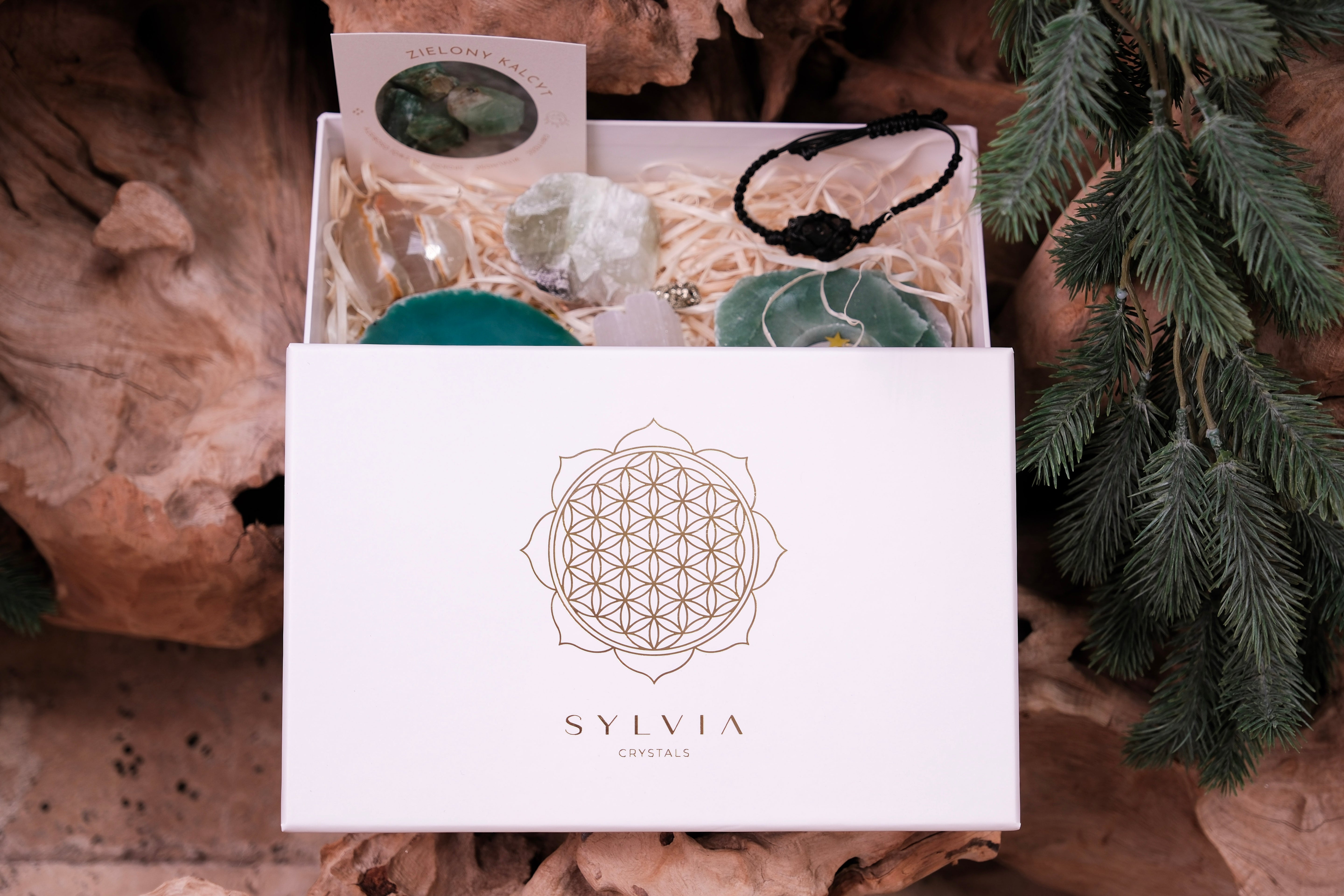 Christmas Crystal Gift Box with crystals and wellness treasures for harmony and positivity, featuring elegant packaging and a festive design.