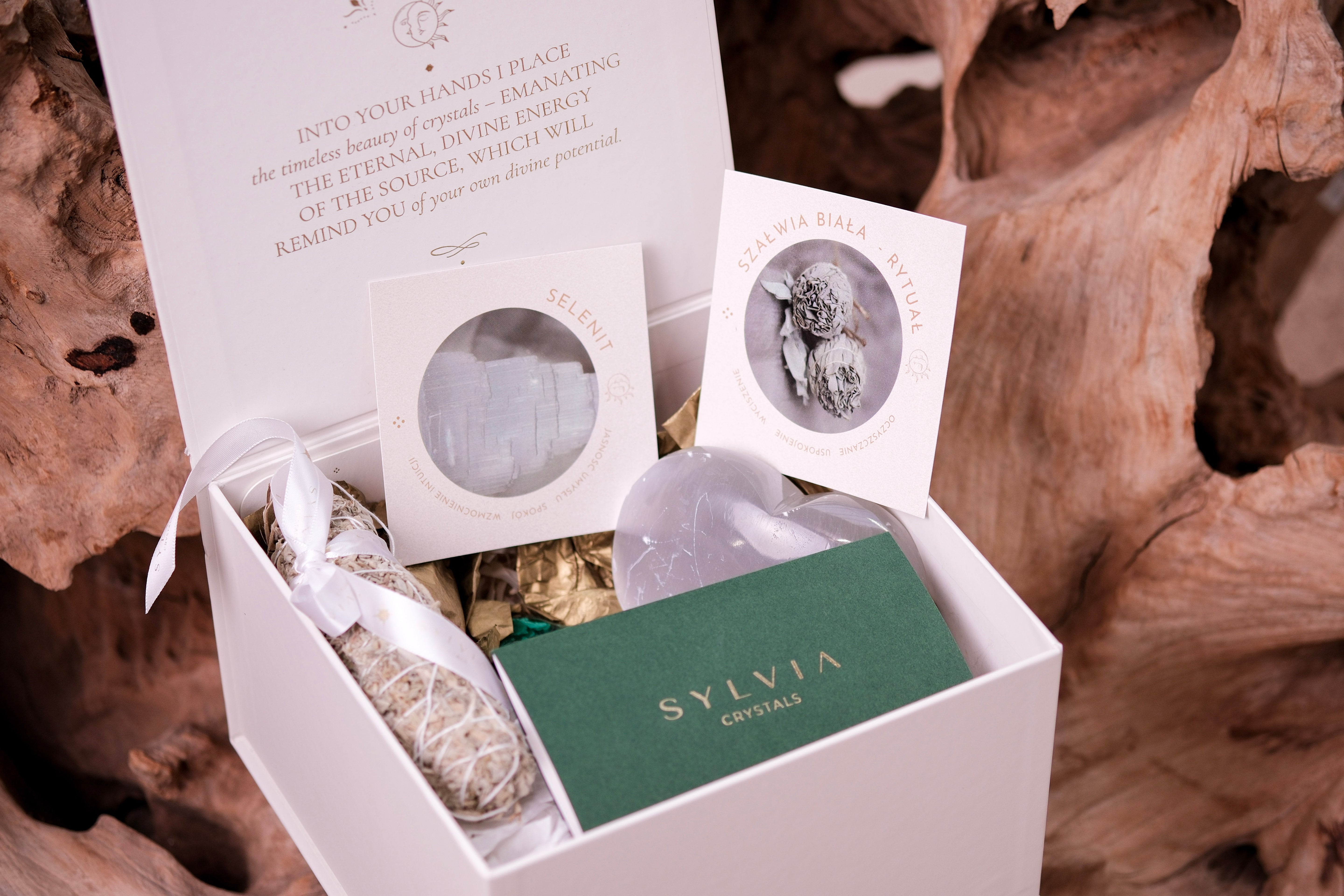 Transformations Deluxe Christmas Box with crystals and white sage by Sylvia Crystals for holiday growth and renewal.