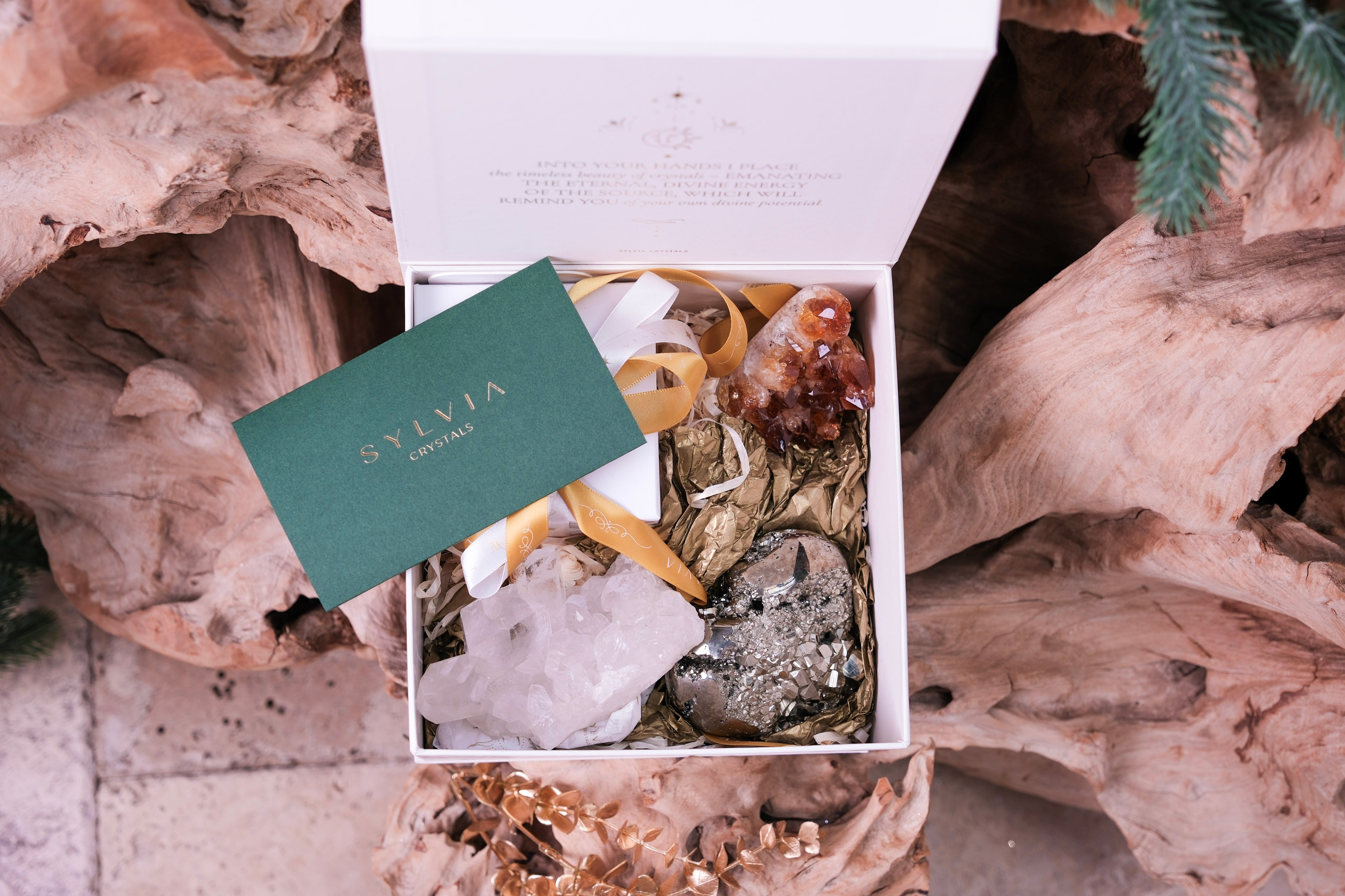 Wealth and Abundance Deluxe Christmas Box with crystals and candle by Sylvia Crystals in an elegant gift box.