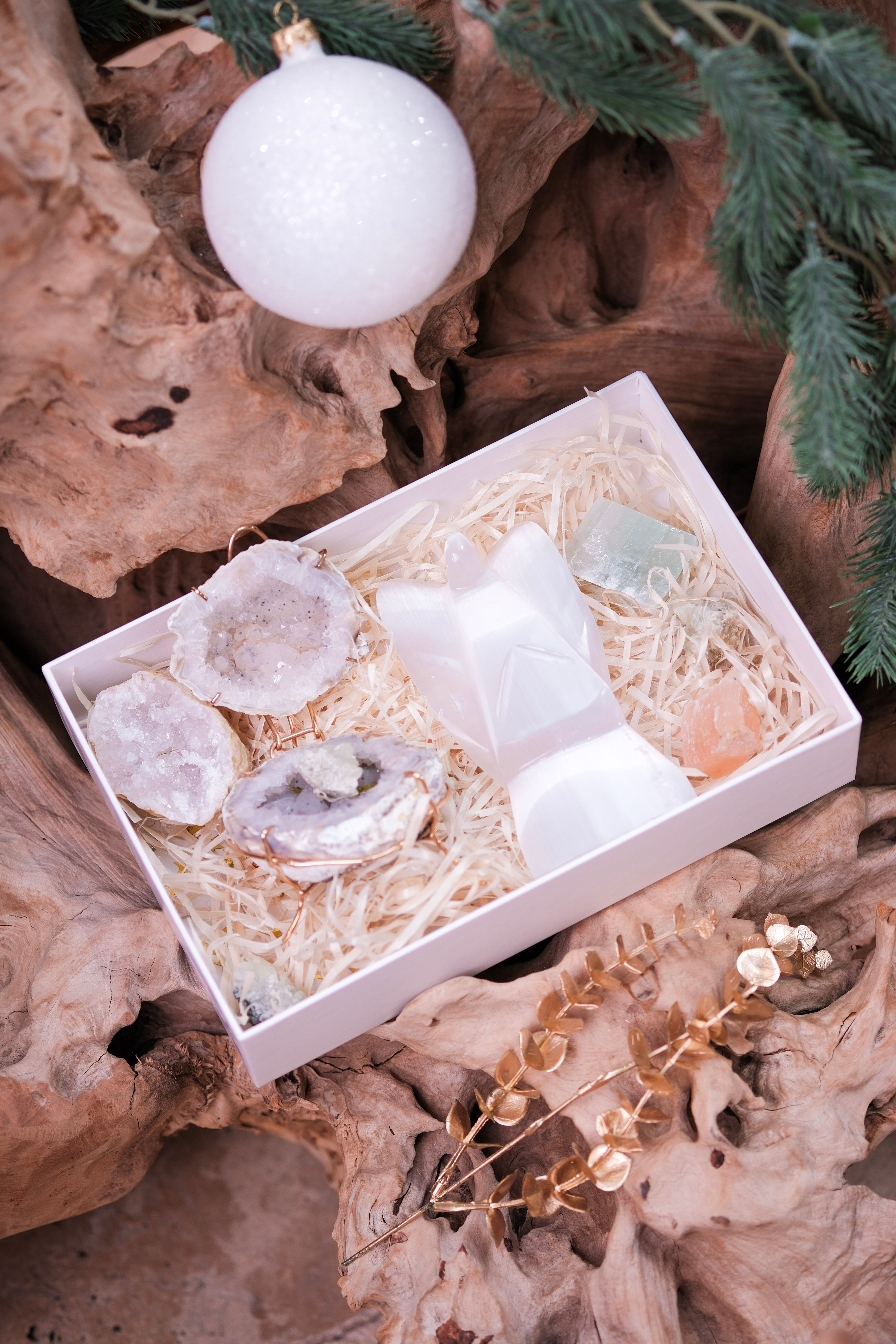 Angelic Elegance Christmas Gift Box with selenite angel, green fluorite, orange selenite, and agate jewelry box amidst holiday decor.