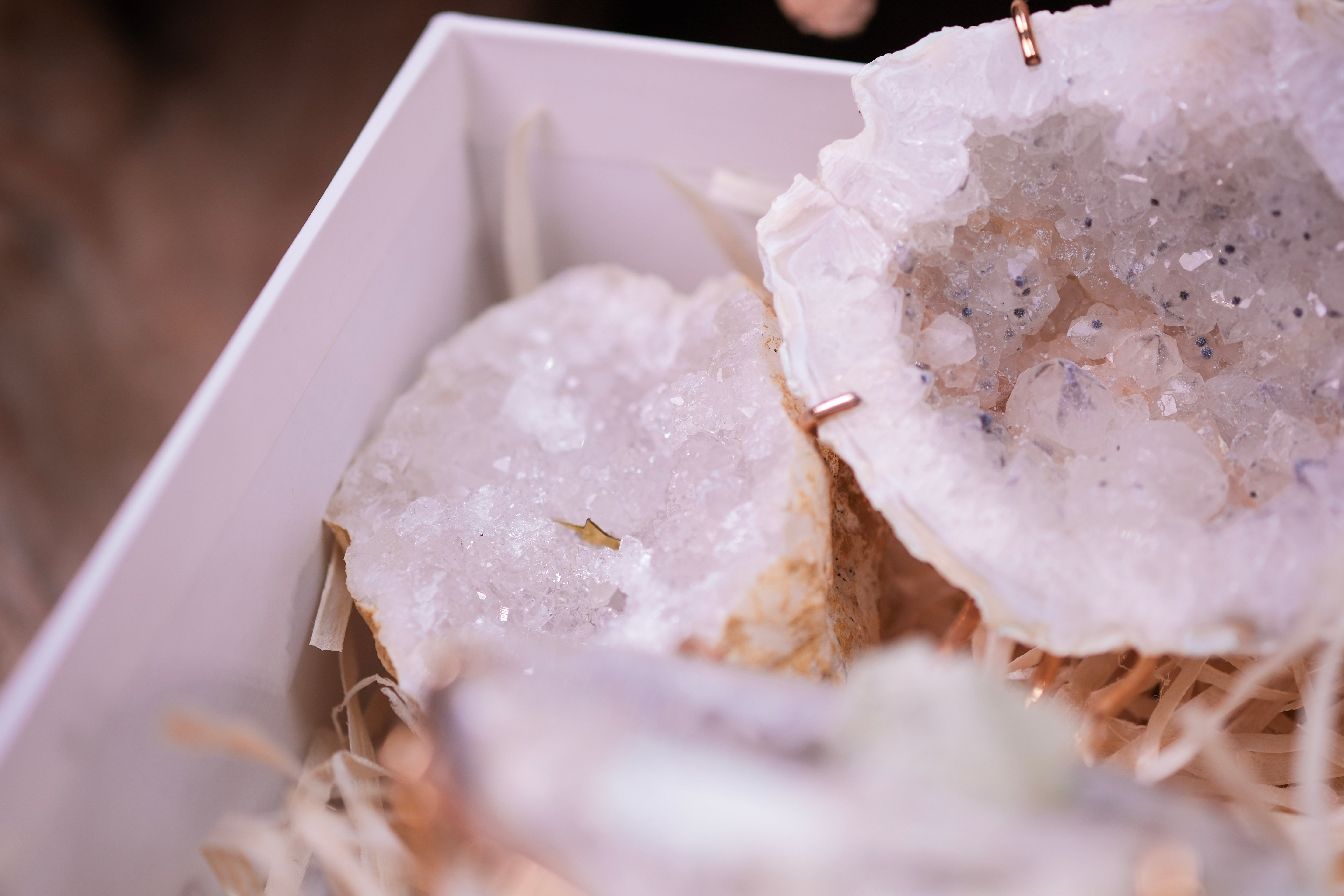 Close-up of crystals in the Angelic Elegance Christmas Gift Box by Sylvia Crystals, featuring a variety of natural stones.