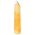 Mexican Calcite Obelisk from Sylvia Crystals, enhancing motivation, focus, and energy for personal and professional growth.