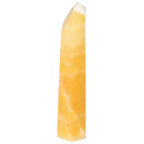 Mexican Calcite Obelisk by Sylvia Crystals, enhancing motivation and focus, ideal for personal and professional growth.