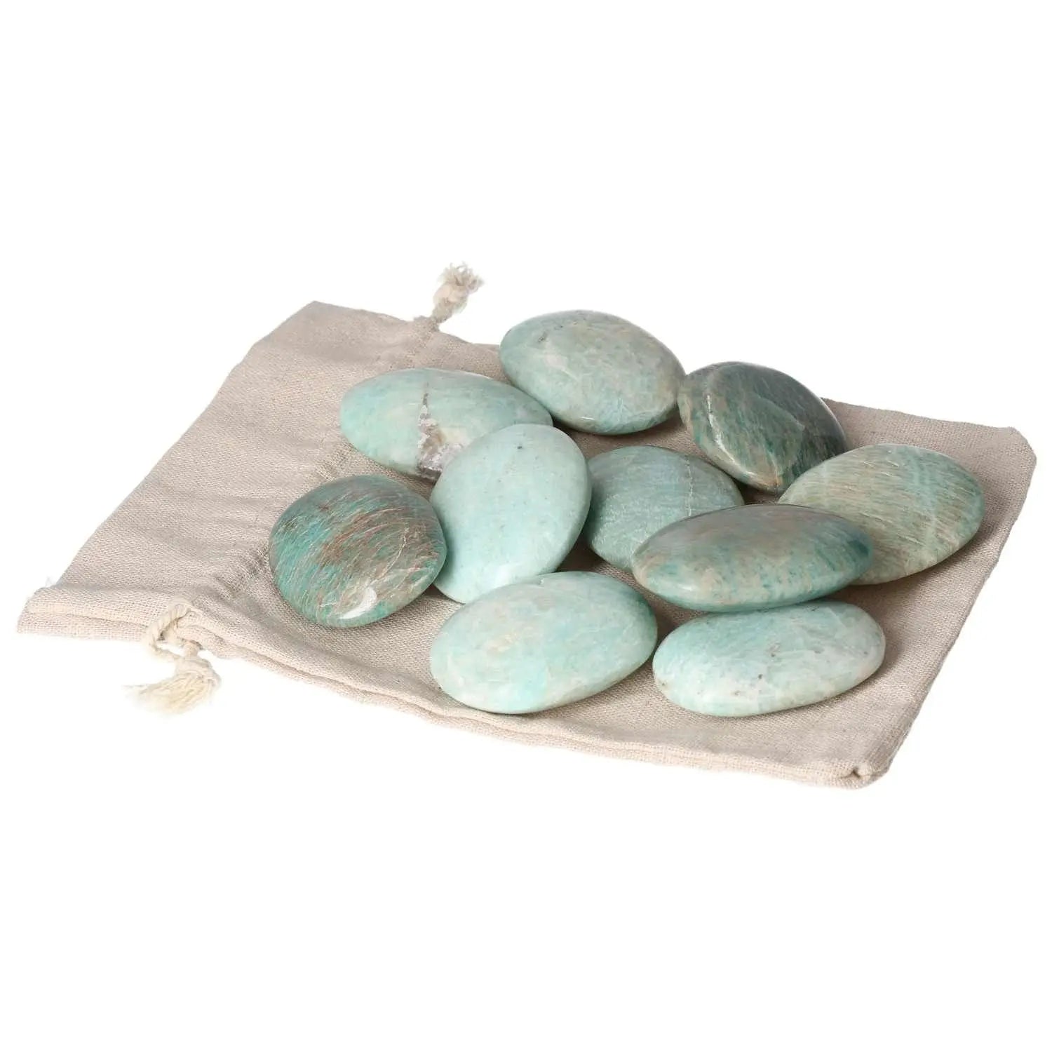 Amazonite palm stones on a beige fabric pouch, showcasing their calming, blue-green hues and spiritual elegance.