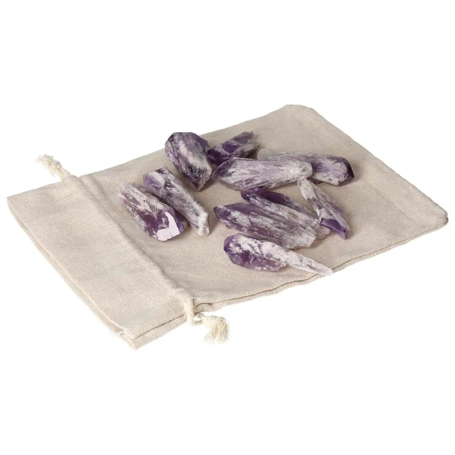 Amethyst Point S crystal set from Sylvia Crystals on beige pouch, enhancing tranquility and elegance in any space.