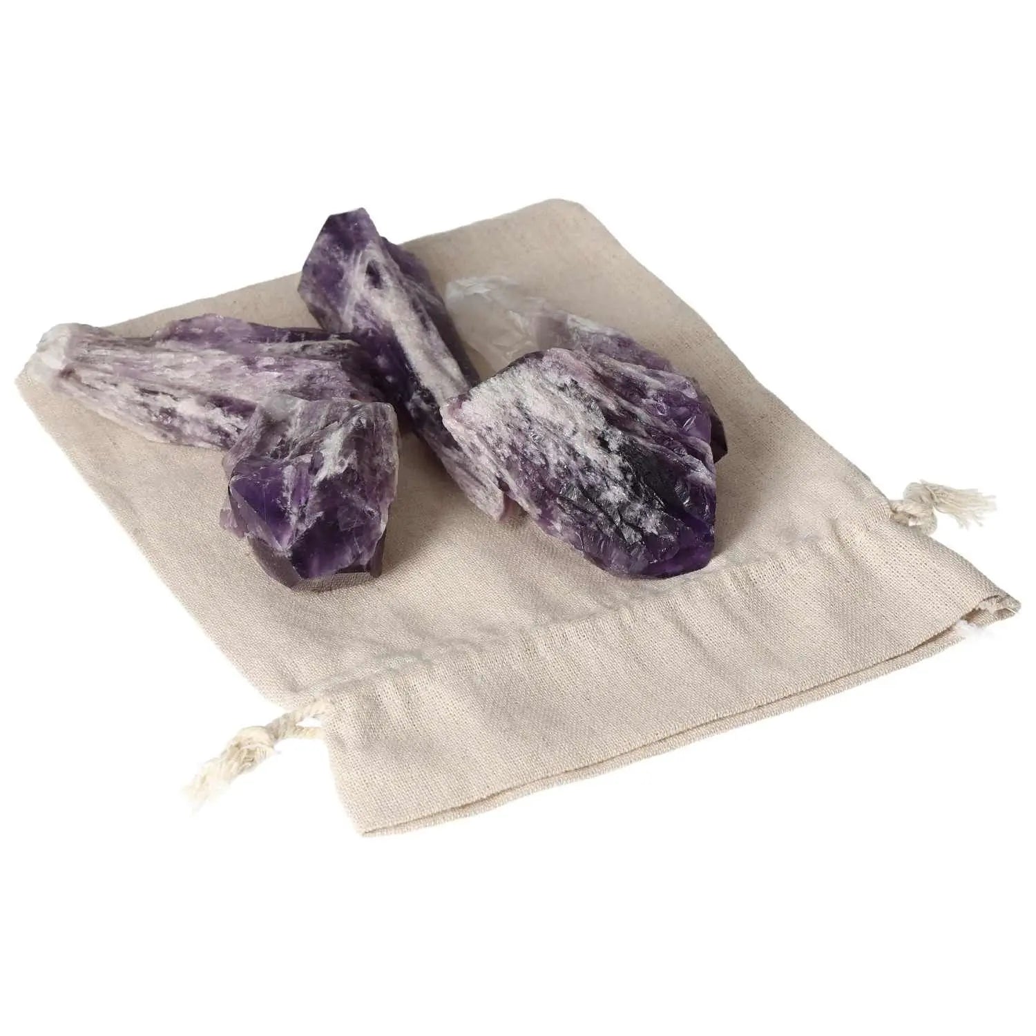 Amethyst Point L by Sylvia Crystals on a cloth bag, showcasing its spiritual and energy-boosting properties to enhance concentration.