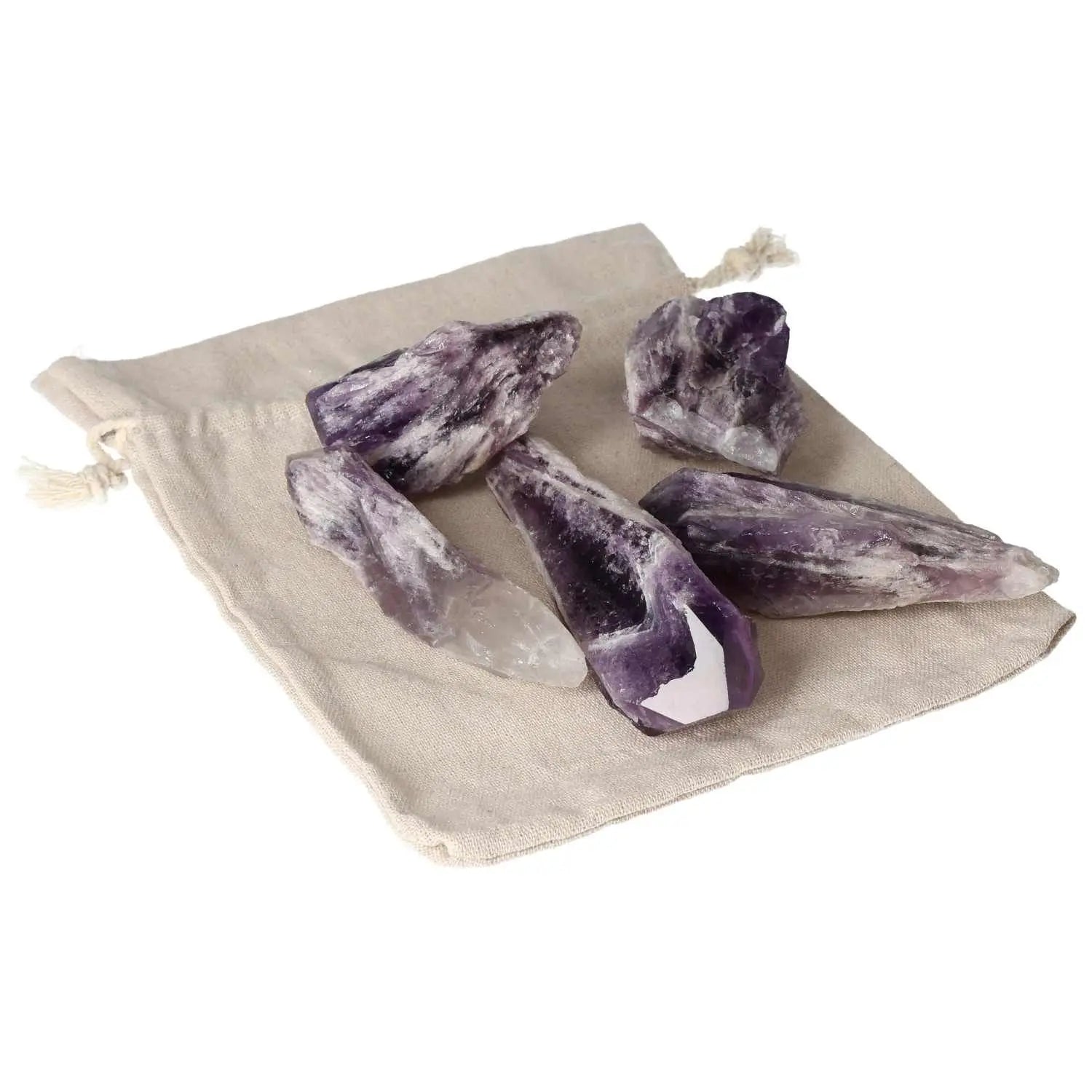 Collection of Amethyst Point L crystals on a cloth bag, showcasing the vibrant purple hue and energy-boosting properties by Sylvia Crystals.