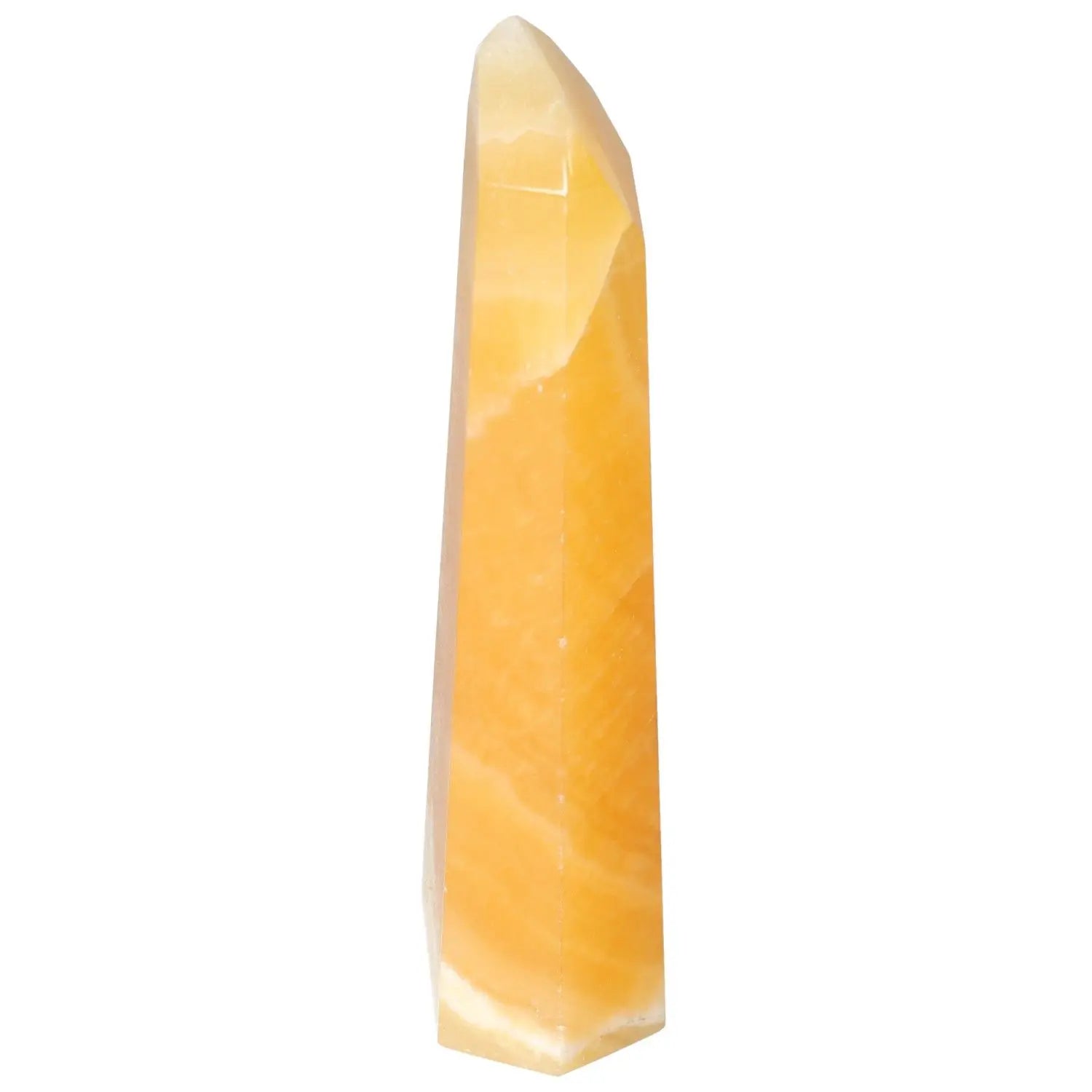 Mexican Calcite Obelisk crystal, offering transformative energy and luxury design by Sylvia Crystals. Enhance positivity and self-discovery.