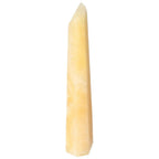 Mexican Calcite Obelisk from Sylvia Crystals, vibrant yellow hue, promotes self-confidence and spiritual growth, luxury home decor piece.
