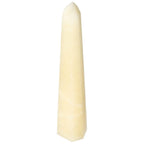 Mexican Calcite Obelisk by Sylvia Crystals enhances spiritual harmony, fostering confidence and motivation for personal growth.
