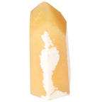 Mexican Calcite Obelisk from Sylvia Crystals, enhancing self-confidence and motivation with premium craftsmanship.