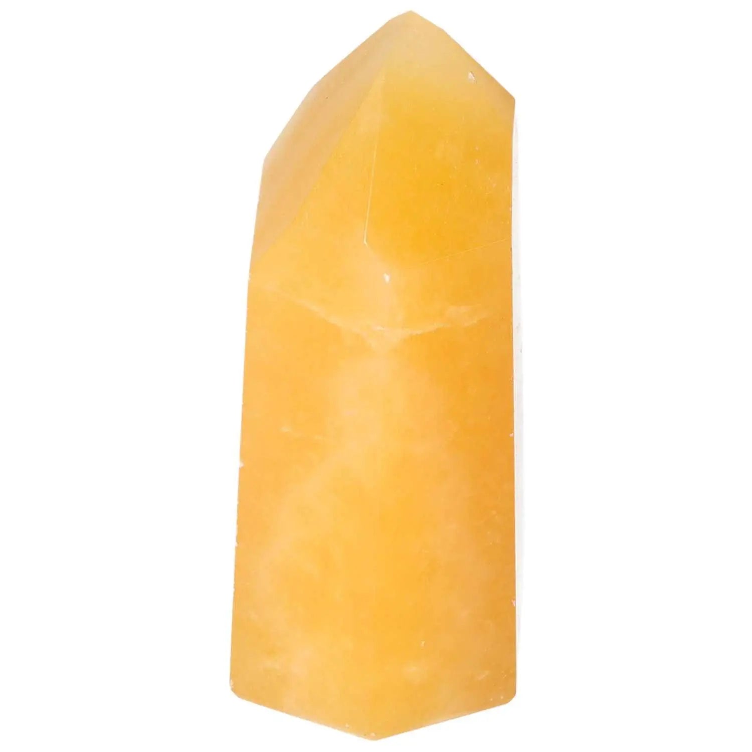 Mexican Calcite Obelisk from Sylvia Crystals, enhancing self-confidence and motivation, embodies luxury craftsmanship and transformation.
