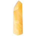 Mexican Calcite Obelisk by Sylvia Crystals, enhancing motivation and focus with natural earth energies.