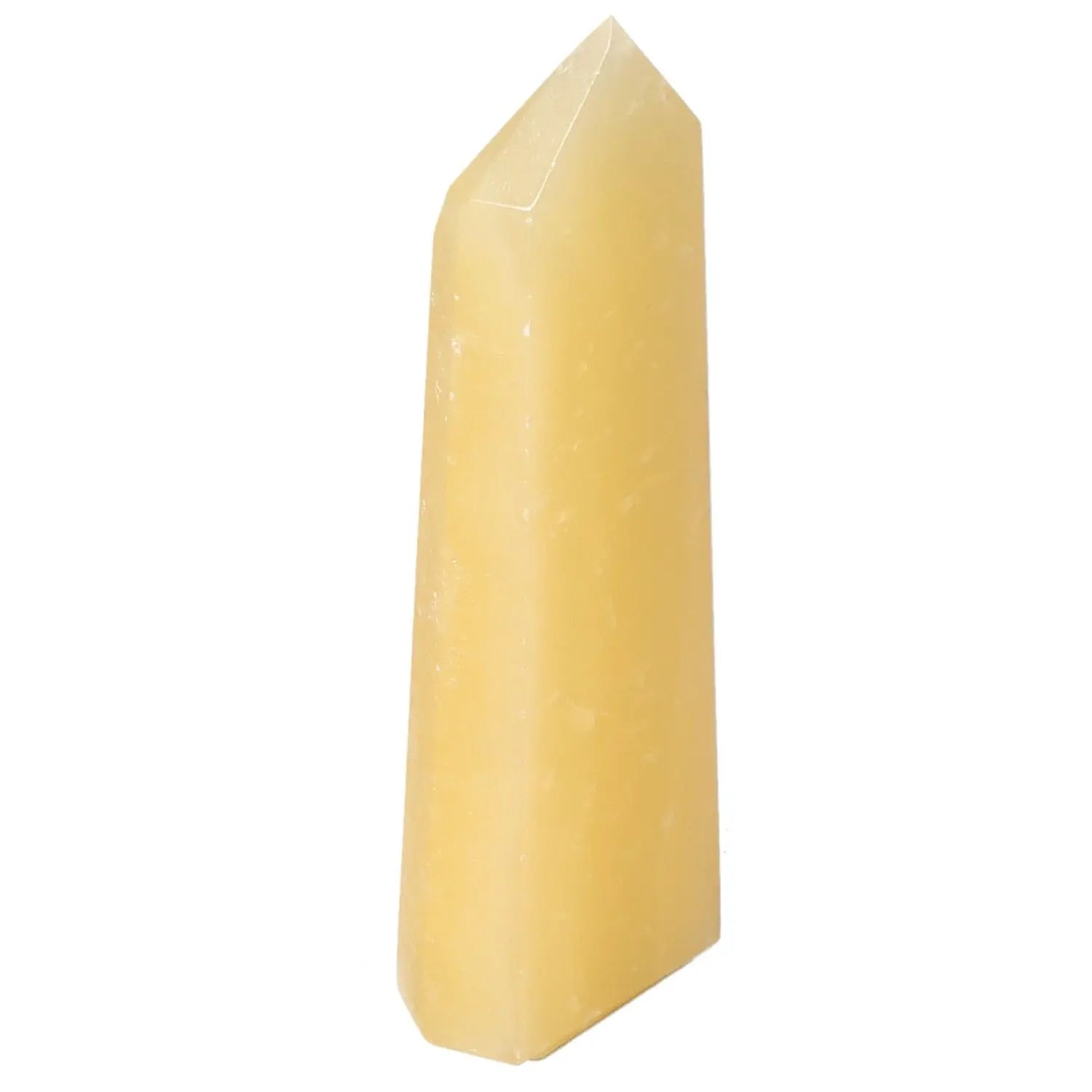 Mexican Calcite Obelisk from Sylvia Crystals, enhancing self-confidence and motivation; a symbol of luxury and spirituality.